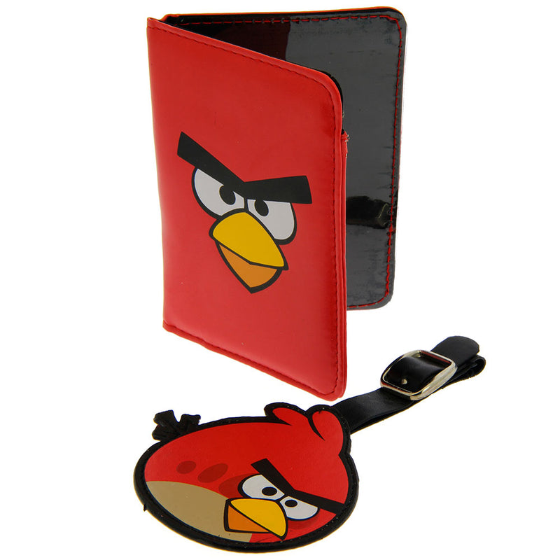 Angry Birds Passport Holder and Luggage Tag .The vinyl Luggage tag is in the shape of Red Angry Bird face on one side and other side has ID window plus adjustable strap with metal buckle side. Easy to help you spot your luggage. .Exclusively Available at Reliance Gifts www.reliancegifts.co.uk