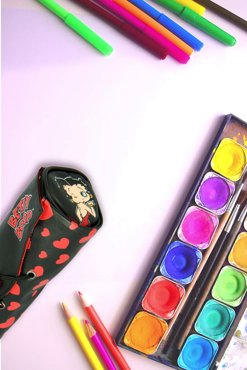 Betty Boop Red Heart Pencil Case A lovely black colour pencil case with hearts design in front and Betty’s in a winking pose on both the sides. This is made with PU material wit hearts design with soft red fabric inner lining inside the pencil case. Exclusively Available at Reliance Gifts www.reliancegifts.co.uk