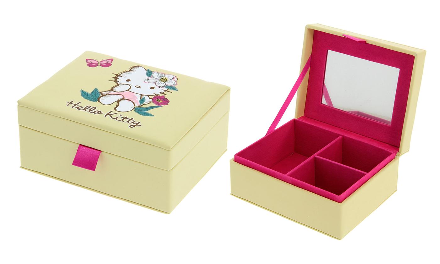 Hello Kitty - Vintage Bloom Jewellery Box is a lovely jewellery box with Kitty in a vintage look with flower and butterfly and a pink dress with Hello Kitty written at the bottom. Exclusively Available at Reliance Gifts www.reliancegifts.co.uk