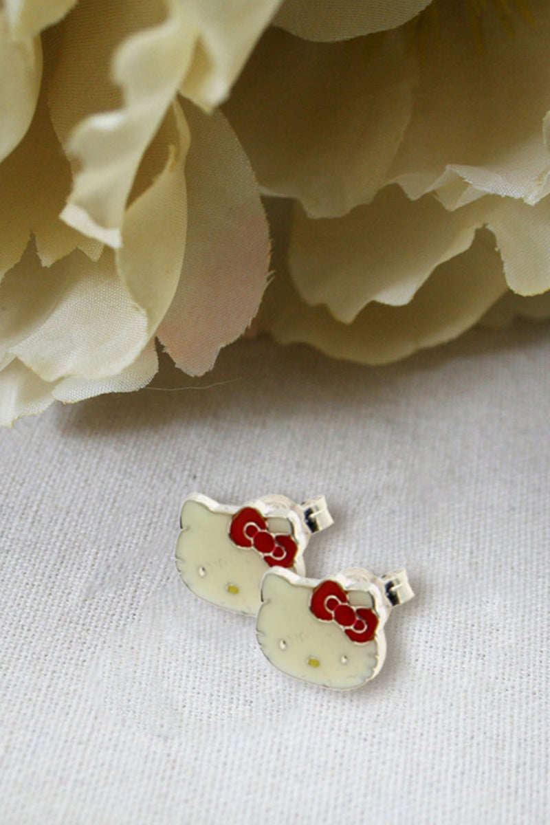 Hello Kitty Earrings An elegant white enamel coated Hello kitty face with a red bow and a little yellow nose made from 925 Sterling Silver Range. The workmanship is fine with attention been paid to all the minute detailing. Exclusively Available at Reliance Gifts www.reliancegifts.co.uk
