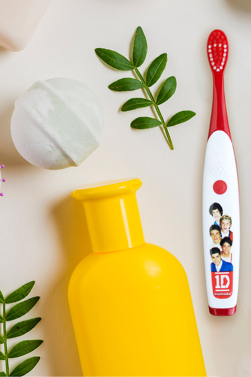 Brush Buddies One Direction Singing Tooth Brush One Direction Singing (Live while we’re young) is designed in USA and looks great with a cute picture of all the band members on the handle looking back at you. Exclusively Available at Reliance Gifts ww.reliancegifts.co.uk